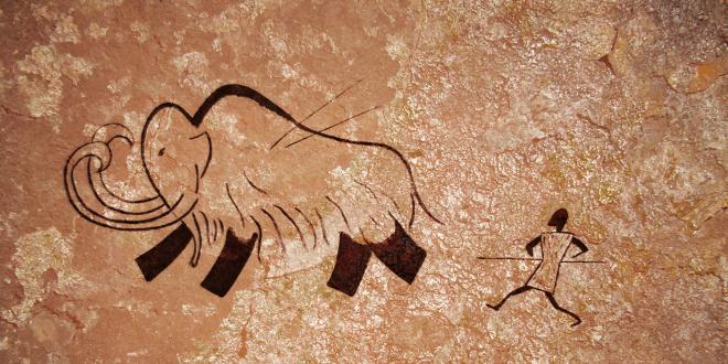 a cave drawing of hunting for food